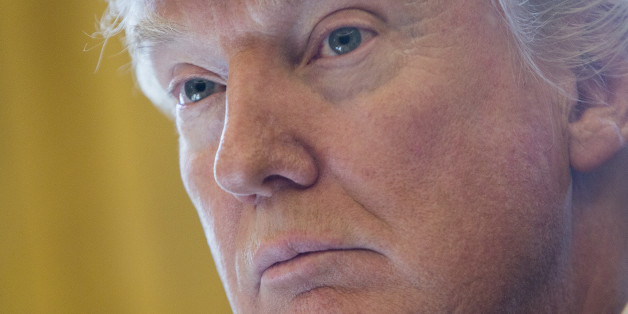 U.S. President Donald Trump listens during a meeting with Brian Krzanich, chief executive officer of Intel Corp., not pictured, at The White House in Washington, D.C., U.S., on Wednesday, Feb. 8, 2017. Trump defended his power to put limits on who can enter the U.S., saying it shouldn't be challenged in the courts even as a three-judge panel weighs whether to reinstate restrictions on refugees and travelers from seven predominantly Muslim nations. Photographer: Chris Kleponis/Pool via Bloomberg
