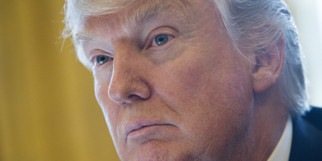 U.S. President Donald Trump listens during a meeting with Brian Krzanich, chief executive officer of Intel Corp., not pictured, at The White House in Washington, D.C., U.S., on Wednesday, Feb. 8, 2017. Trump defended his power to put limits on who can enter the U.S., saying it shouldn't be challenged in the courts even as a three-judge panel weighs whether to reinstate restrictions on refugees and travelers from seven predominantly Muslim nations. Photographer: Chris Kleponis/Pool via Bloomberg