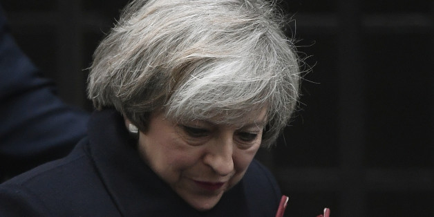 Britain's Prime Minister Theresa May leaves Number 10 Downing Street to attend Prime Minister's Questions at parliament in London, Britain, February 8, 2017. REUTERS/Toby Melville
