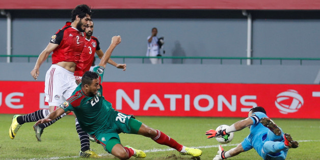 Football Soccer - African Cup of Nations - Quarter Finals - Egypt v Morocco- Stade de Port Gentil - Gabon - 29/1/17. Egypt's goalkeeper Essam El Hadary saves the ball from Morocco's Aziz Bouhaddouz in the game. REUTERS/Amr Abdallah Dalsh