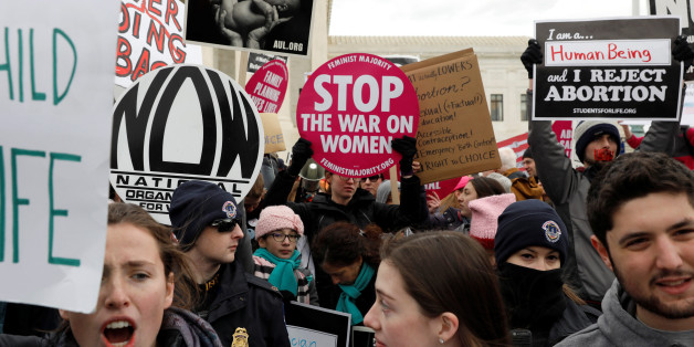 Pro-life activists gather outside the Supreme Court for the National March for Life rally in Washington, DC, U.S. January 27, 2017. REUTERS/Aaron P. Bernstein