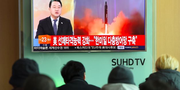 People watch the news showing file footage of North Korea's missile launch at a railway station in Seoul on February 12, 2017.
North Korea fired a ballistic missile on February 12 in an apparent provocation to test the response from new US President Donald Trump, the South Korean defence ministry said. / AFP / JUNG Yeon-Je (Photo credit should read JUNG YEON-JE/AFP/Getty Images)