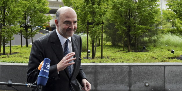 European Economic and Financial Affairs Commissioner Pierre Moscovici arrives at a Eurozone finance ministers emergency meeting on Greece in Brussels, Belgium June 22, 2015. A new Greek offer for a cash-for-reforms deal raised hopes of an agreement as euro zone leaders prepared for an emergency summit on Monday, with EU officials welcoming the proposals as a "good basis for progress" to avert a default by Athens. REUTERS/Eric Vidal