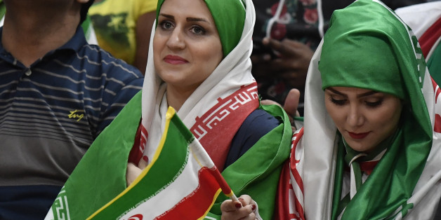 Iran supporters attend the men's qualifying volleyball match between Iran and Egypt at the Maracanazinho stadium in Rio de Janeiro on August 13, 2016, during the Rio 2016 Olympic Games. / AFP / PHILIPPE LOPEZ (Photo credit should read PHILIPPE LOPEZ/AFP/Getty Images)