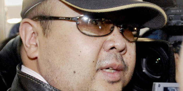Beijing, CHINA: A man believed to be North Korean leader Kim Jong-Il's eldest son, Kim Jong-Nam, is surrounded by journalists upon his arrival at Beijing's capital airport, 11 February 2007. Wearing a cap, sunglasses and jeans, the man who Japanese television crew described as Kim Jong-Nam arrived at Beijing's airport from Macau in the afternoon, as six-nation talks on ending North Korea's nuclear weapons programme were underway in the Chinese capital. Kim Jong-Nam, 35, was recently reported to