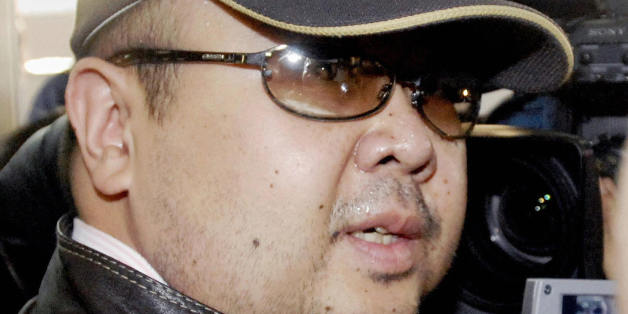 Beijing, CHINA: A man believed to be North Korean leader Kim Jong-Il's eldest son, Kim Jong-Nam, is surrounded by journalists upon his arrival at Beijing's capital airport, 11 February 2007. Wearing a cap, sunglasses and jeans, the man who Japanese television crew described as Kim Jong-Nam arrived at Beijing's airport from Macau in the afternoon, as six-nation talks on ending North Korea's nuclear weapons programme were underway in the Chinese capital. Kim Jong-Nam, 35, was recently reported to