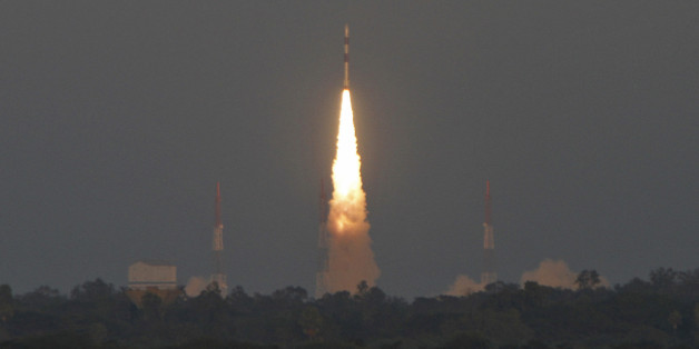 India's Polar Satellite Launch Vehicle (PSLV) C-20 blasts off, carrying Indo-French satellite SARAL from the Satish Dhawan space centre at Sriharikota, north of the southern Indian city of Chennai February 25, 2013. The Indian rocket carried seven satellites - the Indo-French satellite SARAL, world's first smart phone-operated nano satellite, a space telescope satellite and four other foreign satellites, local media reported on Monday. REUTERS/Babu (INDIA - Tags: SCIENCE TECHNOLOGY TPX IMAGES OF