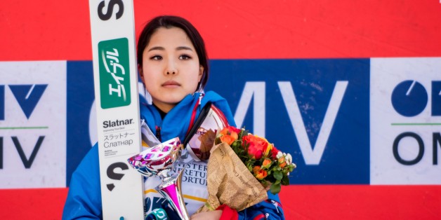 First placed Takanashi Sara of Japan poses on the podium after the Normal hill individual probe during the second day at the FIS Ski Jumping World Cup in Rasnov, central Romania, on January 29, 2017. (Photo by Catalin Adrian Soare/NurPhoto via Getty Images)
