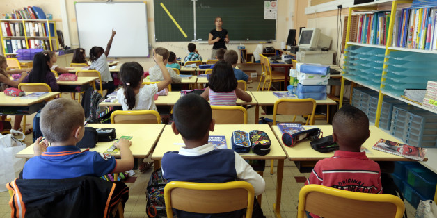 Elementary school children are seen in a classroom on the first day of class in the new school year in Nice, September 3, 2013. REUTERS/Eric Gaillard (FRANCE - Tags: EDUCATION)