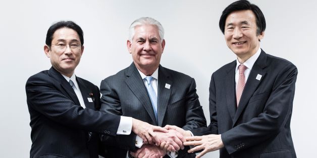 Japan's Foreign Minister Fumio Kishida (L), US Secretary of State Rex Tillerson (C) and South Korean Foreign Minister Yun Byung-Se (R) shake hands before a meeting at the World Conference Center February 16, 2017 in Bonn, Germany.
US Secretary of State Rex Tillerson makes his diplomatic debut at a G20 gathering in Germany on February 16, 2017 where his counterparts hope to find out what 'America First' means for the rest of the world. / AFP / Brendan Smialowski (Photo credit should read BRENDAN SMIALOWSKI/AFP/Getty Images)