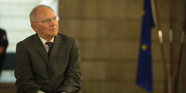 BERLIN, GERMANY - JANUARY 8: German finance Minister Wolfgang Schaeuble welcomes carolers from Berlin at the Finance Ministry on January 8, 2015 in Berlin, Germany. According to media reports Schaueble now sees an exit by Greece from the Eurozone, meaning Greece would give up the Euro and return to a national currency. (Photo by Christian Marquardt/Getty Images)