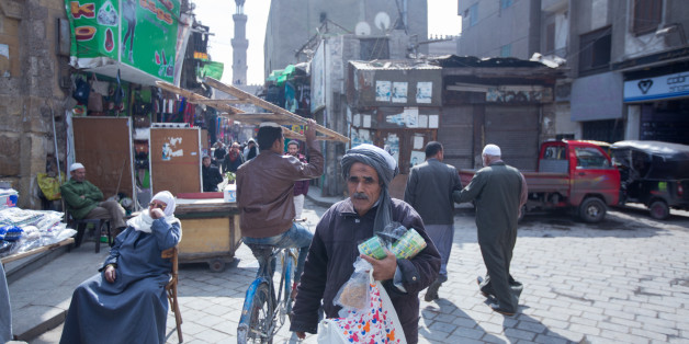 A poor man walking in a street in Old Cairo Friday, February 17, 2017 (Photo by Fayed El-Geziry/NurPhoto via Getty Images)