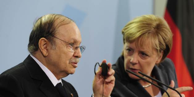 German Chancellor Angela Merkel (R) and Algerian President Abdelaziz Bouteflika address a press conference at the chancellery in Berlin December 8, 2010. AFP PHOTO / JOHN MACDOUGALL (Photo credit should read JOHN MACDOUGALL/AFP/Getty Images)
