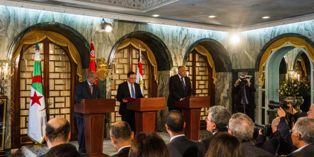 TUNIS, TUNISIA - FEBRUARY 20: Tunisian Foreign Minister Khemaies Jhinaoui (C), Algerian Minister for Maghreb and Africa Affairs Abdel Kadir Mesahil (L) and Egyptian Foreign Minister Sameh Shoukry (R) hold a joint press conference following their meeting to solve the crisis in Libya, at Carthage Palace in Tunis, Tunisia on February 20, 2017. (Photo by Amine Landoulsi/Anadolu Agency/Getty Images)
