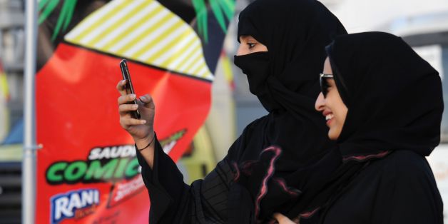 A Saudi woman films using her mobile during the first ever Comic-Con event in the coastal City of Jeddah, on February 16, 2017.
The first edition of the US-based pop culture Comic-Con is being held in Saudi Arabia featuring a mix of robots, gaming and Saudi television and film industry luminaries. / AFP / FAYEZ NURELDINE (Photo credit should read FAYEZ NURELDINE/AFP/Getty Images)