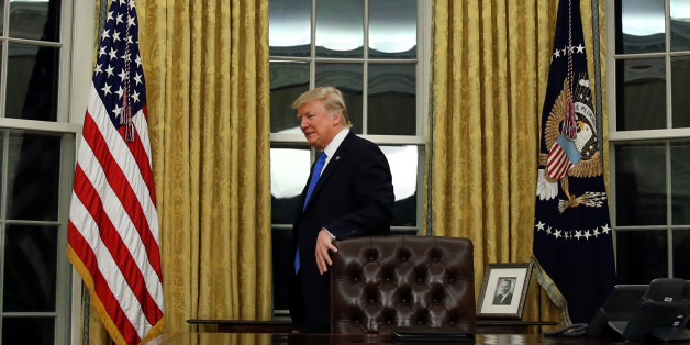 U.S. President Donald Trump attends a swearing in ceremony for the new U.S. Secretary of State Rex Tillerson (not pictured) at the Oval Office of the White House in Washington, DC, U.S., February 1, 2017. REUTERS/Carlos Barria