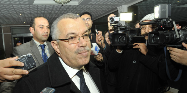 Tunisian justice minister and candidate for the post of prime minister, Noureddine Bhiri speaks to journalists as he arrives for a meeting at Ennahda ruling party's headquarters on February 21, 2013 in Tunis. Tunisia was scrambling to find a replacement prime minister and pull itself out of a major political crisis two days after Hamadi Jebali quit after failing to form a cabinet of technocrats. AFP PHOTO / FETHI BELAID (Photo credit should read FETHI BELAID/AFP/Getty Images)