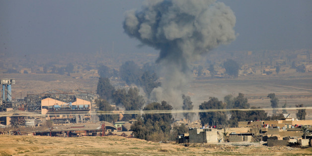 Smoke rises after a rocket fired by Iraqi forces in Albu Saif hit village held by Islamic State militants south of Mosul, Iraq February 21, 2017. REUTERS/Alaa Al-Marjani