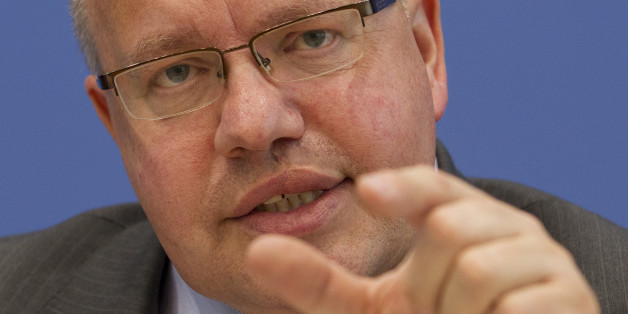 Germany's new Environment Minister Peter Altmaier speaks during a news conference to outline his policy plans for his term in office in Berlin, May 31, 2012. REUTERS/Thomas Peter (GERMANY - Tags: POLITICS)