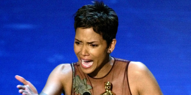 Actress Halle Berry reacts to winning the Oscar for Best Actress during
the 74th annual Academy Awards in Hollywood March 24, 2002. Berry won
the Academt Award for her role in the film "Monster's Ball".
REUTERS/Gary Hershorn PICTURE EMBARGOED FROM REDISTRIBUTION FOR
ONLINE/INTERNET USE UNTIL CONCLUSION OF ACADEMY AWARDS TELECAST
JM