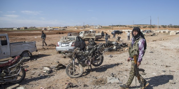 ALEPPO, SYRIA - FEBRUARY 24: Site of the bomb attack by the Daesh terrorist group killing at least 35 people in northern Syria's strategic Al-Bab area on February 24, 2017. Daesh detonated a bomb-laden vehicle at a Free Syrian Army (FSA) position in Susyan village, according to local sources. Initial reports indicated at least 35 people died, with civilians and FSA members among the fatalities, the sources added. (Photo by Emin Sansar/Anadolu Agency/Getty Images)