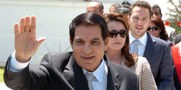 Tunisian President Zine El Abidine Ben Ali (front) waves to wellwishers after voting for the municipal elections next to his wife Leila (C) and his son-in-law the Tunisian businessman Sakhr Materi (R) on May 9, 2010 in Tunis. Polls opened in Tunisia on May 9, 2010, for municipal elections in which the ruling party of long-time President Zine El Abidine Ben Ali is widely tipped to come out victorious. AFP PHOTO/ FETHI BELAID (Photo credit should read FETHI BELAID/AFP/Getty Images)