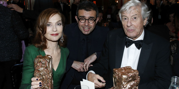 PARIS, FRANCE - FEBRUARY 24: Isabelle Huppert, Sa'd Ben Sa'd and Paul Verhoven attend the Cesar's Dinner at Le Fouquet's on February 24, 2017 in Paris, France. (Photo by Rindoff/Charriau/Getty Images)