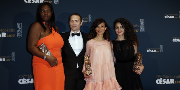Director Houda Benyamina poses during a photocall with producer Marc-Benoit Creancier, actress Deborah, Best Supporting Actress Award, and actress Oulaya Amamra, Best Female Newcomer Award, for the film "Divines" at the 42nd Cesar Awards ceremony in Paris, France, February 24, 2017. REUTERS/Gonzalo Fuentes