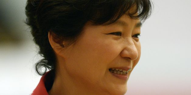 South Korean President Park Geun-Hye attends the ASEAN Plus Three Summit at the Myanmar International Convention Center in Myanmar's capital Naypyidaw on November 13, 2014. The Association of Southeast Asian Nations (ASEAN) and East Asia summits, held in the purpose-built capital of Naypyidaw this week, are the culmination of a year of diplomatic limelight for Myanmar after long decades shunted to the sidelines under its former military rulers. AFP PHOTO / Christophe ARCHAMBAULT (Photo c