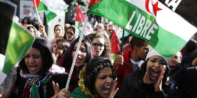 People from Western Sahara shout slogans as they wave Western Sahara's flags in support of Free Western Sahara in Madrid. ProtesterssSay That The Moroccan regime is torturing and violating the human rights of the Saharawi population in the Occupied Territories. We urge the Spanish Government to fulfill its responsibility and facilitate self-determination referendum for the Saharawi people. Photo: Rodrigo Garcia/NurPhoto (Photo by NurPhoto/Corbis via Getty Images)