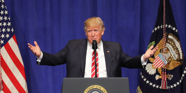 U.S. President Donald Trump speaks to commanders and coalition representatives during a visit to U.S. Central Command and U.S. Special Operations Command at MacDill Air Force Base in Tampa, Florida, U.S., February 6, 2017. REUTERS/Carlos Barria