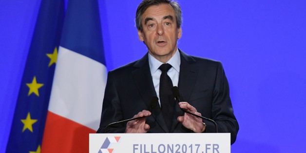 French presidential election candidate for the right-wing Les Republicains (LR) party Francois Fillon delivers a speech during a press conference on March 1, 2017 in Paris. Fillon said he will be charged over allegations he paid his wife and children for fake jobs but that he would not pull out of the campaign. Fillon, a conservative, said he would meet investigating magistrates on March 15 but denied all the allegations against him and reiterated that his family had 'assisted' him during his po