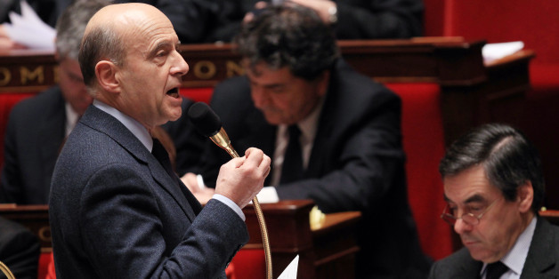 French Foreign Affairs minister Alain Juppé delivers a speech during the weekly session of questions to the government at the National Assembly on February 8, 2012 in Paris. On the eve, French Prime Minister Francois Fillon and his ministers stormed out of parliament in protest after an opposition deputy accused the government of flirting with Nazi ideology. Socialist MP Serge Letchimy said that Claude Gueant 'brings us day after day back to these European ideologies which gave birth to the