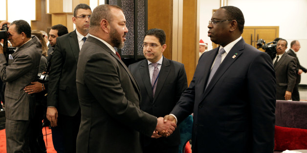 King Mohammed VI of Morocco (L) shakes hand with President of Senegal Macky Sall at the opening of the Africa Action Summit, on the sidelines of the UN Climate Change Conference 2016 (COP22) in Marrakech, Morocco November 16, 2016. REUTERS/Youssef Boudlal