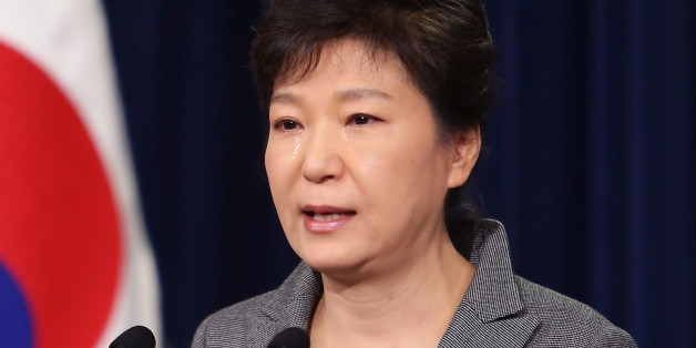 SEOUL, SOUTH KOREA - MAY 19: In this handout image provided by the South Korean Presidential Blue House, South Korean President Park Geun-Hye weeps during an address to the nation about the sunken ferry Sewol at the presidential Blue House on May 19, 2014 in Seoul, South Korea. (Photo by South Korean Presidential Blue House via Getty Images)