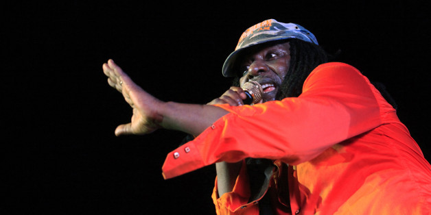Ivorian reggae singer Alpha Blondy performs during the closing ceremony of the Market for African Performing Arts (MASA) Festival at the Culture Palace in Abidjan March 8, 2014. Picture taken March 8, 2014. REUTERS/Thierry Gouegnon (IVORY COAST - Tags: SOCIETY ENTERTAINMENT)