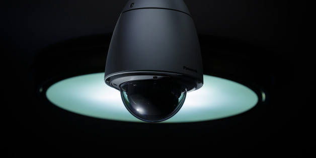 BERLIN, GERMANY - JANUARY 23: A surveillance camera can be seen in front of a lamp on January 23, 2017 in Berlin, Germany. (Photo by Thomas Trutschel/Photothek via Getty Images)
