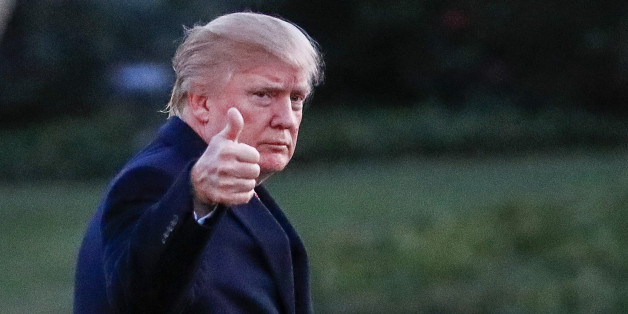 WASHINGTON, DC - MARCH 05: President Donald J. Trump waves as he walks across the South Lawn towards the White House on March 5, 2017 in Washington, DC. Trump is returning from a weekend at his Mar-a-Lago clu in Palm Beach. Florida. (Photo by Erik S. Lesser-Pool/Getty Images)