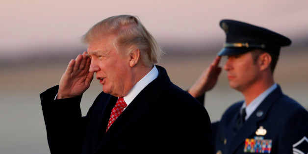 U.S. President Donald Trump arrives aboard Air Force One, as he returns to Washington from a weekend in Florida, at Joint Base Andrews, Maryland, U.S. March 5, 2017. REUTERS/Jonathan Ernst