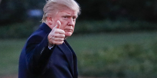 WASHINGTON, DC - MARCH 05: President Donald J. Trump waves as he walks across the South Lawn towards the White House on March 5, 2017 in Washington, DC. Trump is returning from a weekend at his Mar-a-Lago clu in Palm Beach. Florida. (Photo by Erik S. Lesser-Pool/Getty Images)