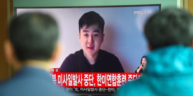 South Koreans watch a television news showing a video footage of a man who claims he is Kim Han-Sol, a nephew of North Korea's leader Kim Jong-Un, at a railway station in Seoul on March 8, 2017.The video of a man describing himself as the son of assassinated North Korean exile Kim Jong-Nam emerged on March 8, apparently the first time a family member has spoken about the killing. / AFP PHOTO / JUNG Yeon-Je (Photo credit should read JUNG YEON-JE/AFP/Getty Images)