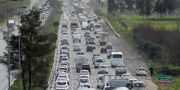Cars drive on a road in the Algerian capital Algiers on February 1, 2017. / AFP / STRINGER (Photo credit should read STRINGER/AFP/Getty Images)