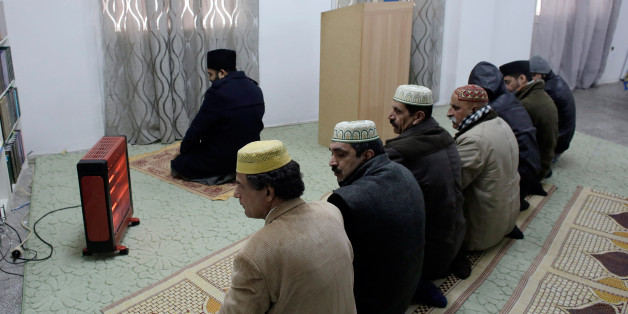 ATHENS, GREECE - FEBRUARY 5: Muslims pray at a Ahmadiyya Muslim Community makeshift mosque that was converted from an apartment on February 5, 2017 in Athens, Greece. Since the end of the Ottoman rule, Athens is the only European capital city without an official mosque. It is estimated there are about one hundred makeshift mosques in the Greek capital. (Photo by Milos Bicanski/Getty Images)