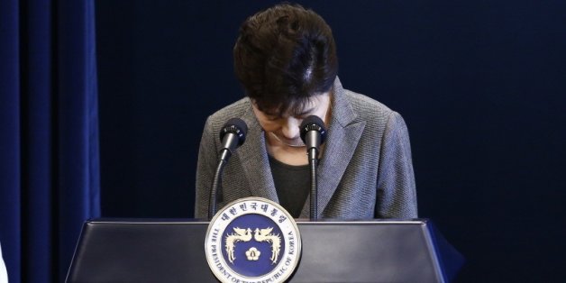 South Korean President Park Geun-Hye bows during an address to the nation, at the presidential Blue House in Seoul on November 29, 2016. South Korea's scandal-hit President Park Geun-Hye said Tuesday she was willing to stand down early and would let parliament decide on her fate. / AFP / AFP AND POOL / JEON HEON-KYUN (Photo credit should read JEON HEON-KYUN/AFP/Getty Images)