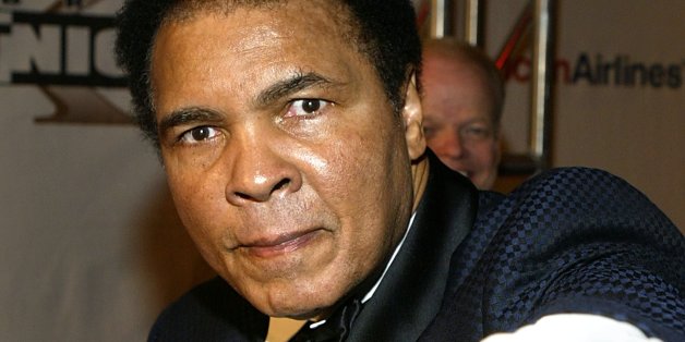 PHOENIX - MARCH 27: Boxing legend Muhammad Ali arrives at 'Celebrity Fight Night X', a charity event to raise money for the Muhammad Ali Parkinson Research Center at Barrow Neurological Institute March 27, 2004 in Phoenix, Arizona. The institute is located in Phoenix and the 'Muhammad Ali Awards' are a way to acknowledge leaders in the sports, entertainment and business communities who best represent the qualities associated with Ali's fight to find a cure. (Photo by Carlo Allegri/Getty Images