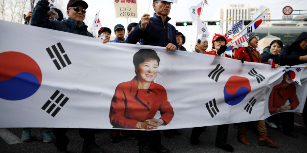 Supporters of South Korea's ousted leader Park Geun-hye march on a street during a protest in Seoul, South Korea, March 11, 2017. REUTERS/Kim Hong-Ji