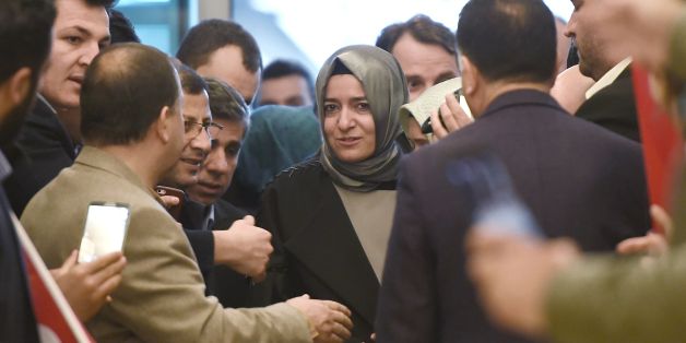 Turkey's Family Minister Fatma Betul Sayan Kaya (C) arrives at the Ataturk International airport on March 12, 2017 in Istanbul. Turkey's Family Minister Fatma Betul Sayan Kaya was back in Istanbul on March 12 after being expelled from the Netherlands and escorted back to Germany by Dutch police, condemning The Hague's 'ugly' treatment. / AFP PHOTO / OZAN KOSE (Photo credit should read OZAN KOSE/AFP/Getty Images)