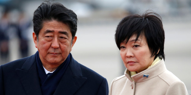 Japan's Prime Minister Shinzo Abe (L) and his wife Akie send off Emperor Akihito and Empress Michiko boarding a special flight for their visit to the Vietnam and Thailand, at Haneda Airport in Tokyo, Japan February 28, 2017. REUTERS/Issei Kato