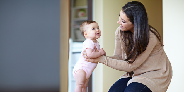 Shot of a mother helping her baby girl standhttp://195.154.178.81/DATA/i_collage/pu/shoots/805468.jpg