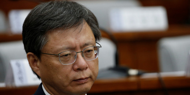 Former presidential secretary Woo Byung-woo attends a hearing at the National Assembly in Seoul, South Korea, December 22, 2016. REUTERS/Kim Hong-Ji